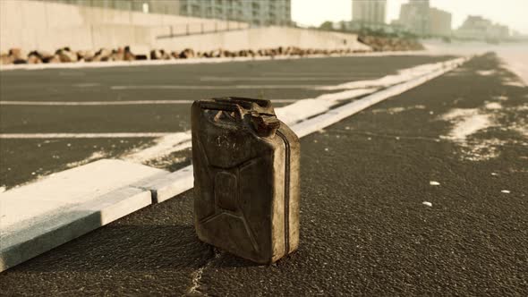 Old Metal Fuel Canister on Beach Parking