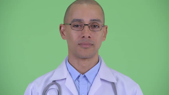 Face of Happy Bald Multi Ethnic Man Doctor Smiling