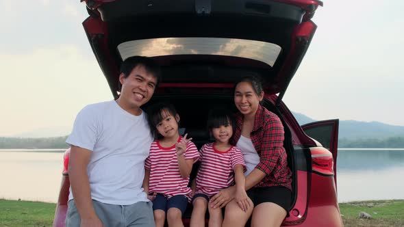 Happy family enjoying road trip on summer vacation.