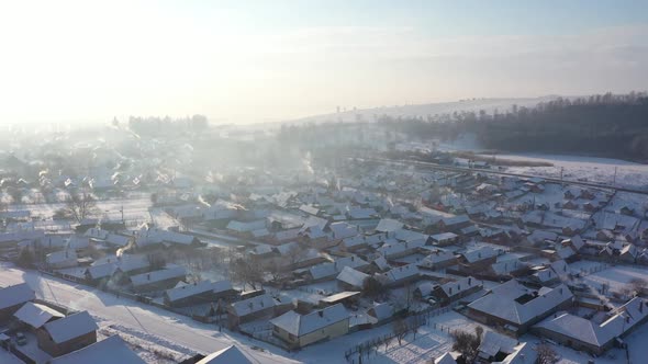 Aerial View Of City With Snow Covered Roofs Houses Neighborhood