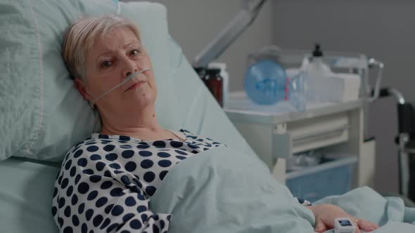 Portrait of Senior Patient with Illness Looking at Camera