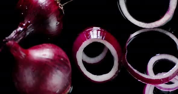 Rings of Red Onion Rolling on the Water. 