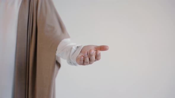 Jesus Hand in a Robe on a White Background