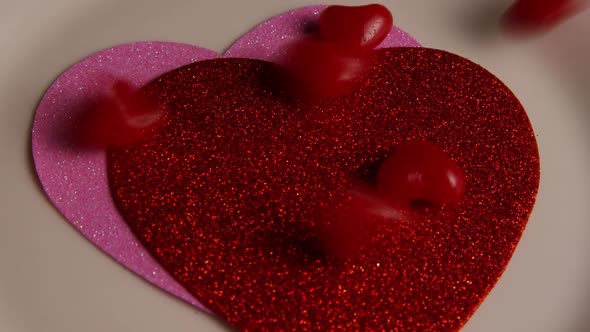 Rotating stock footage shot of Valentines decorations and candies - VALENTINES 0115