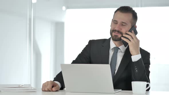 Businessman Talking on Phone