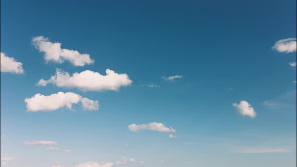 Clouds timelapse on a blue sky