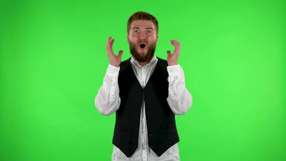 Surprised Man with Shocked Face Expression. Green Screen