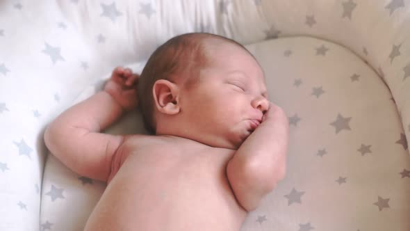 Newborn Baby Sleeping and Waking Up