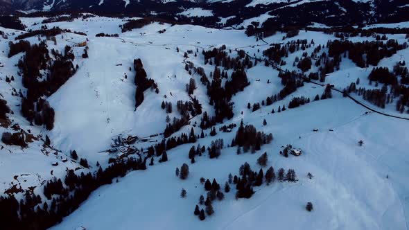 Aerial pan up shot from Alpe di Siusi in the Italian Alps