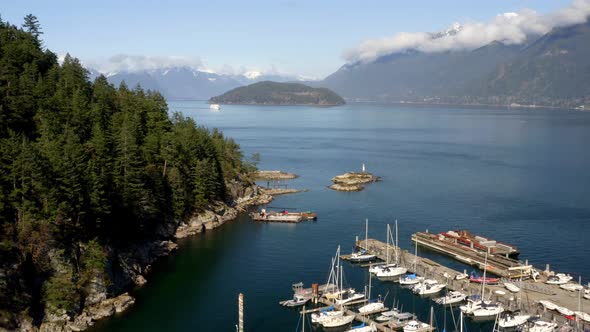 Boats Dock On The Marina In Howe Sound With Bowyer Island In The Distance From Horseshoe Bay In BC,