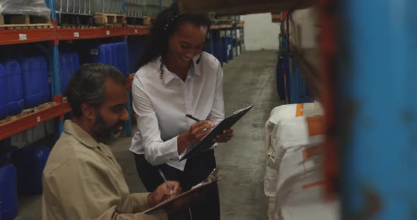 Workers interacting in a warehouse