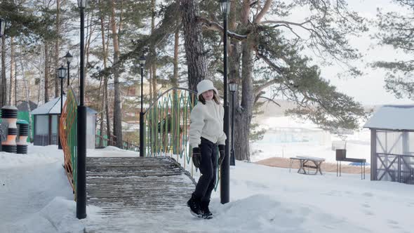 Cute Smiling Teenage Girl Having Fun in Winter Park