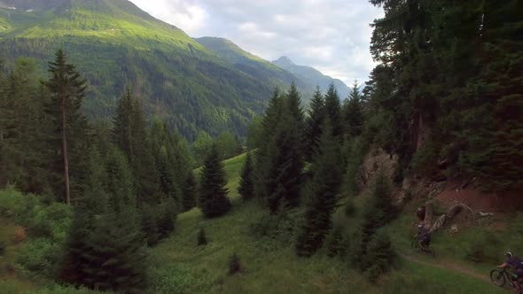 Aerial view of mountain bikers on a scenic singletrack trail