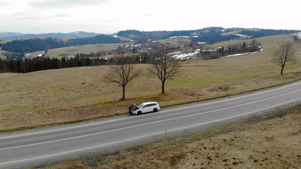 Car Repair on the Road in the Mountains