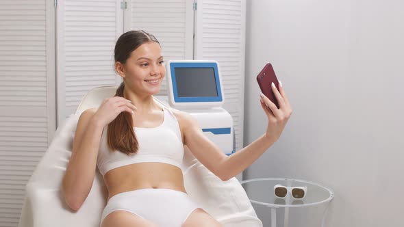 Gorgeous Lady Take Selfie Before Laser Epilation Procedure