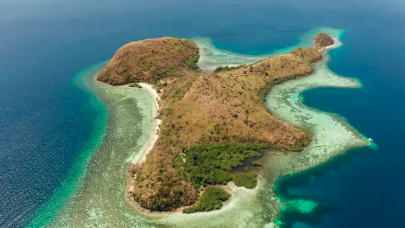 Small Tropical Island with White Sandy Beach, Top View