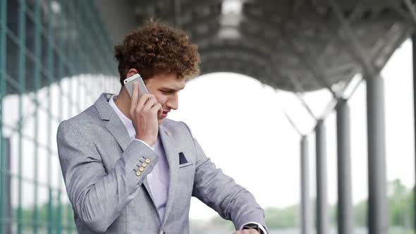 Successful Male Executive Business Man in Suit Waiting for Investor Corporate People Near Office