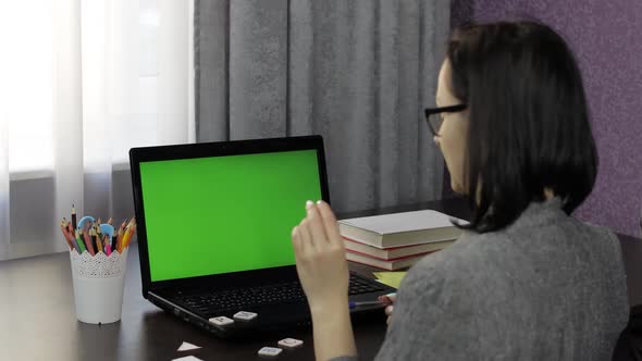 Woman Teacher Making Online Distance Education Video Call on Laptop Green Screen