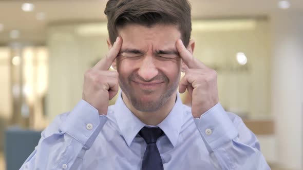 Headache Businessman with Head Pain