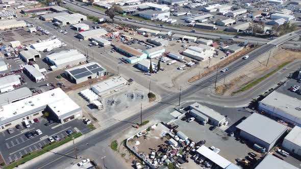 Aerial Drone Urban Industrial Buildings and Freeway in California 4k