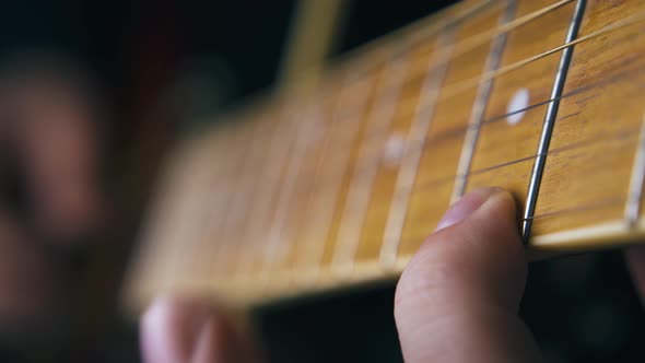 Skilled Musician Plays Acoustic Guitar Nylon Strings Closeup