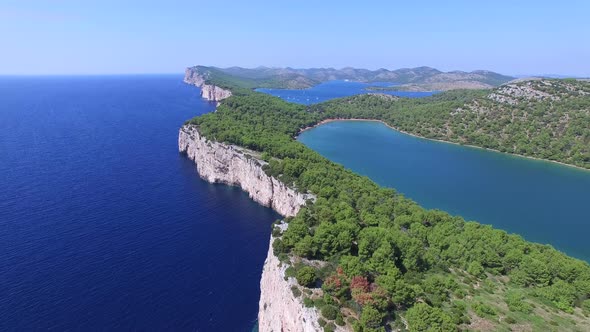 Panoramic view of cliffs and a beautiful salty lake on Dalmatian coast