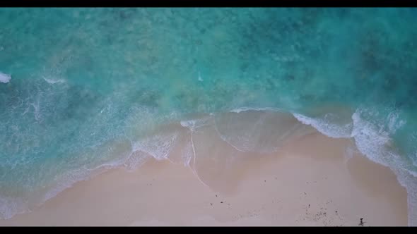 Aerial top view tourism of relaxing shore beach holiday by shallow sea with bright sand background o