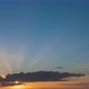 Sun Light Rays Timelapse Behind a Big Cloud during Sunset July France - VideoHive Item for Sale