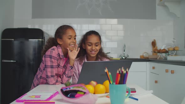 Cheerful Sisters Streaming Video Online on Laptop alt