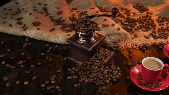 Antique Coffee Mill on Table with Two Cups of Latte