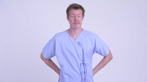 Portrait of Young Man Patient Looking Bored and Tired