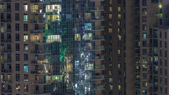 Big Glowing Windows in Modern Residential Buildings Timelapse at Night