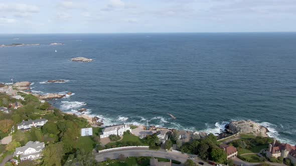 Ocean Waves Crashing On Rocky Coastline Of Marblehead Town At Daytime In Massachusetts, USA. - wide,