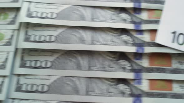 One Hundred Bill of Euro is on a Lot of New Hundred Dollar Bills