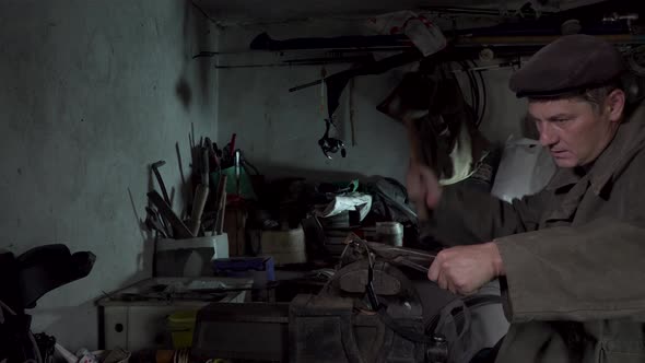 A Man Works in an Old Home Workshop