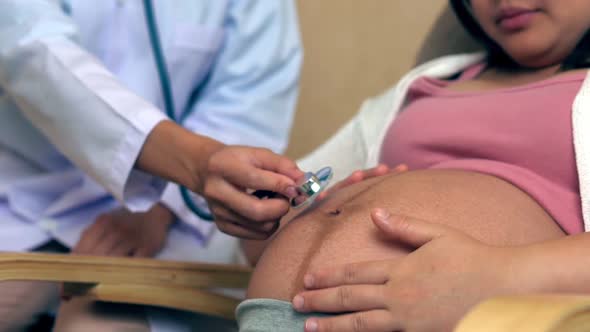 Pregnant Woman and Gynecologist Doctor at Hospital