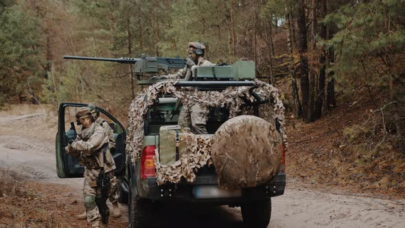 Combating Bandits with Fully Armed Rifles and Machine Gun Truck at Battlefield During Warfare