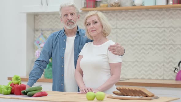 Old Couple Dancing in Kitchen