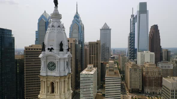 Close up aerial view of Philadelphia center city skyline and city hall tower featuring the William P