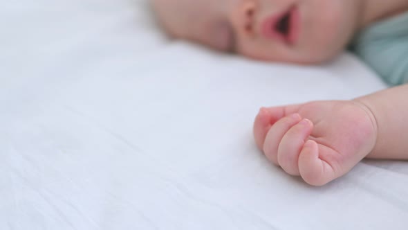 Closeup Portrait of Sleeping Infant Three Months Baby Closed Eyes White Bed