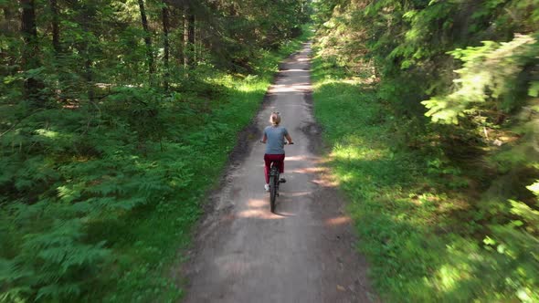 Young Cyclist Riding on a Nice Road