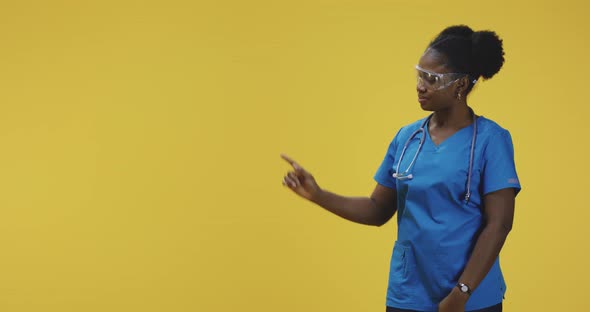 Female Doctor Pointing with Right Hand