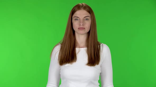 Portrait of Pretty Young Woman Is Scolding, Shaking Her Index Finger and Threatening.