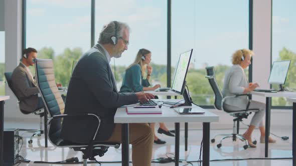 Sitting in office and communicating