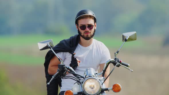 Man sitting on his motorcycle