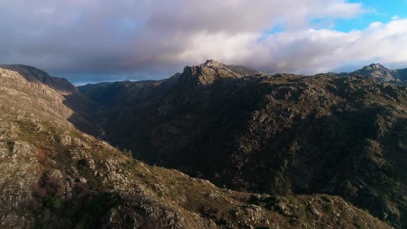 Flying Over Mountain Cliff