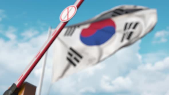 Closed Gate with STOP CORONAVIRUS Sign on Korean Flag Background