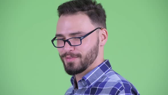 Face of Funny Young Bearded Hipster Man Shaking Shoulders