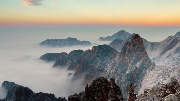 Sunrise time lapse of fog at the Yellow Mountains in China