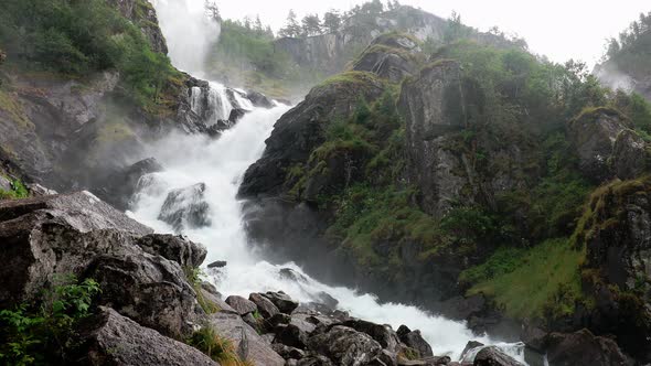 Langfoss (Langfossen) - the fifth highest waterfall in Norway.